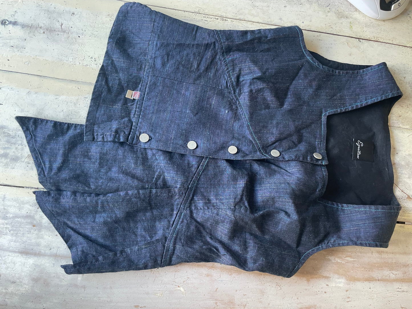 Asymmetrical gilet vest