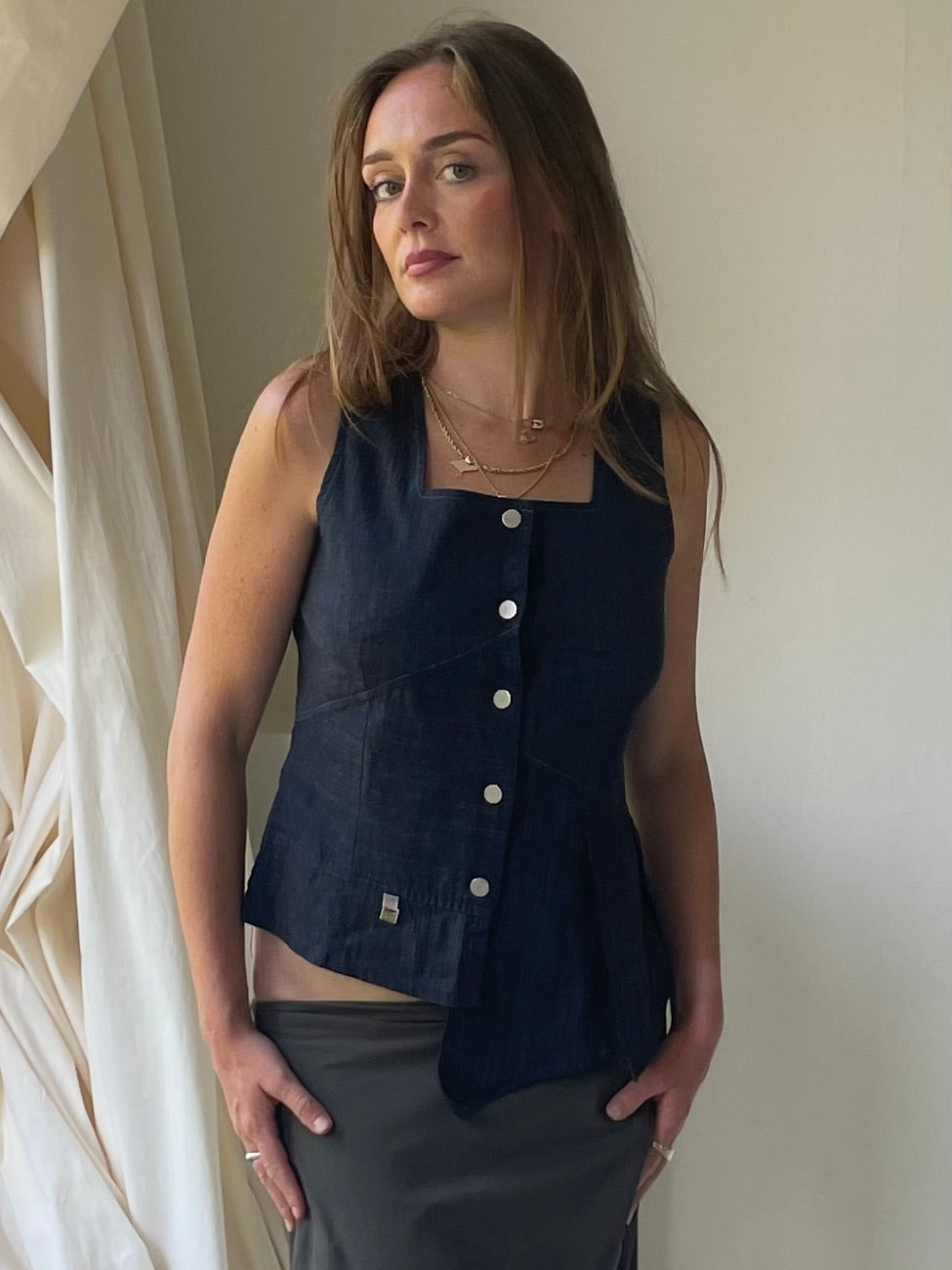 Asymmetrical gilet vest
