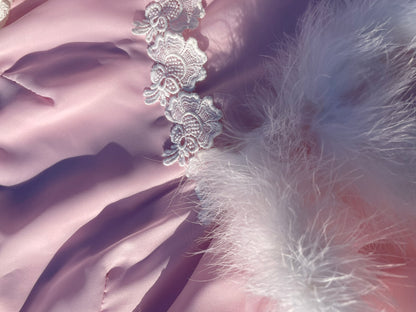 Pink feather trimmed gown with train