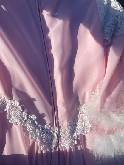 Pink feather trimmed gown with train