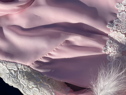 Pink feather trimmed gown with train