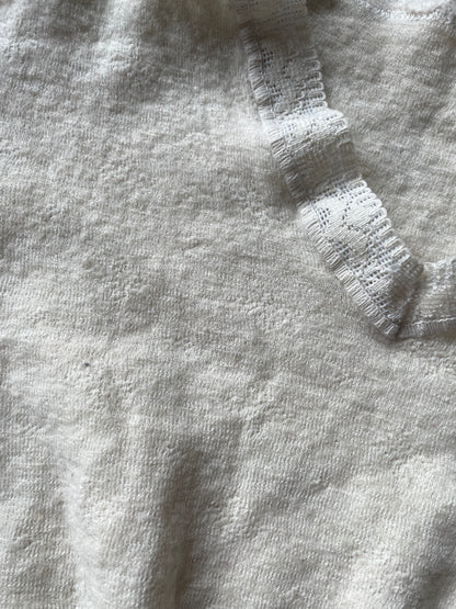 Eyelet lace ribbed peplum wool top