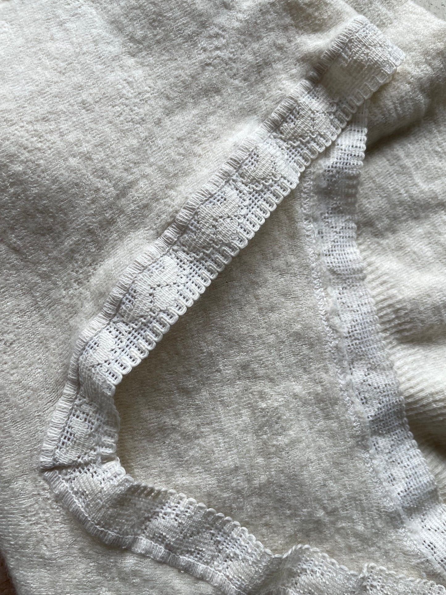 Eyelet lace ribbed peplum wool top