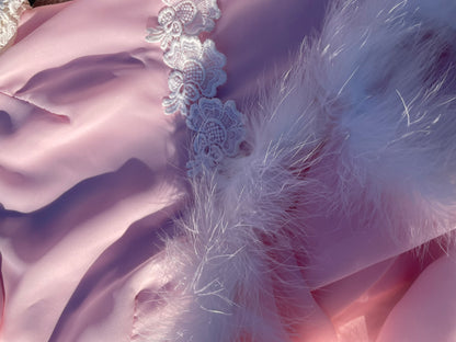Pink feather trimmed gown with train