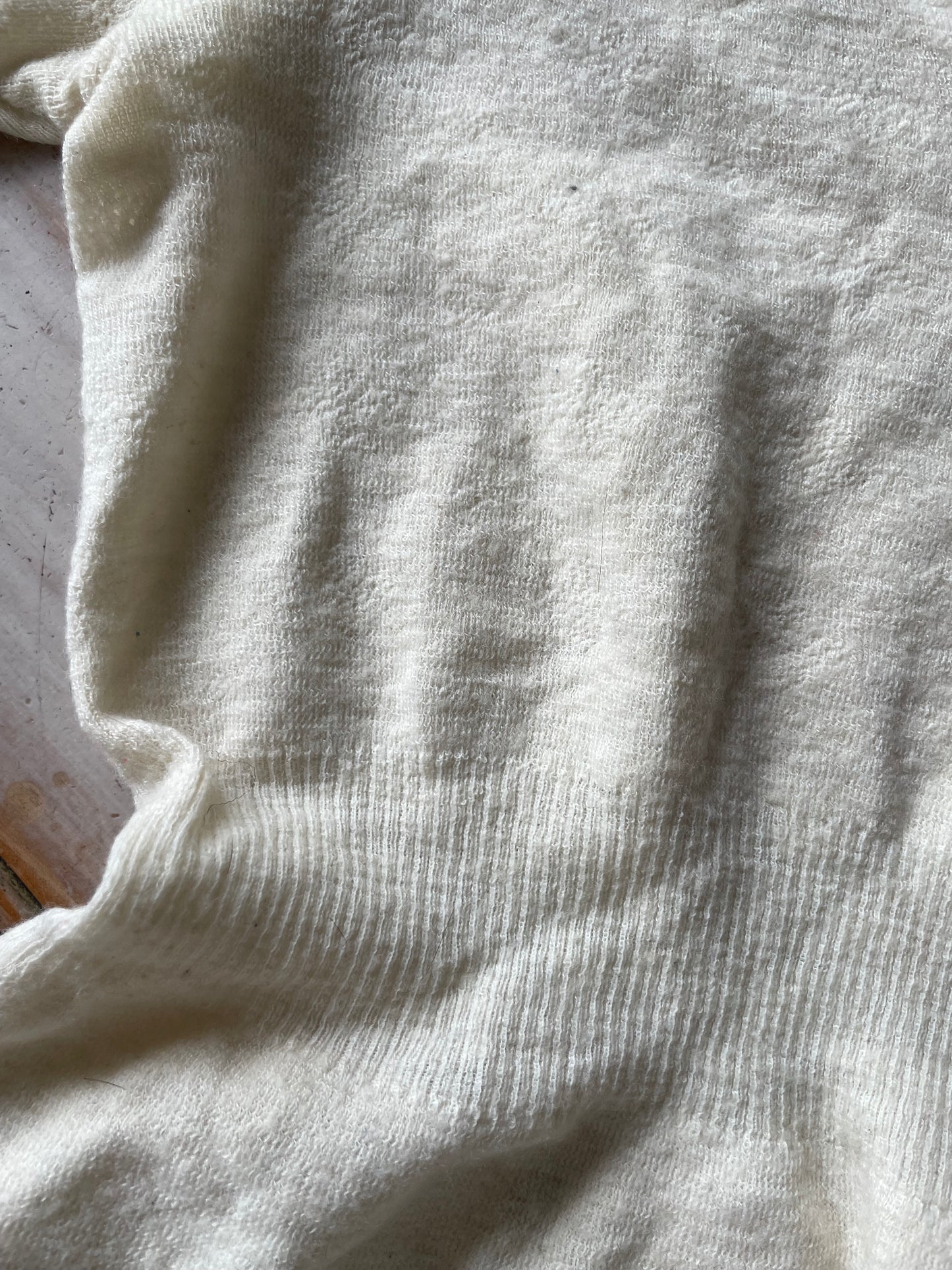 Eyelet lace ribbed peplum wool top