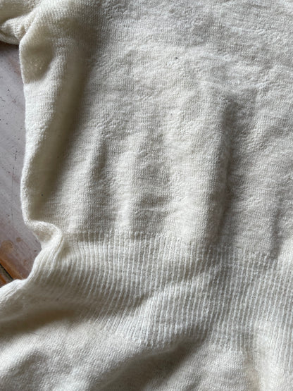 Eyelet lace ribbed peplum wool top