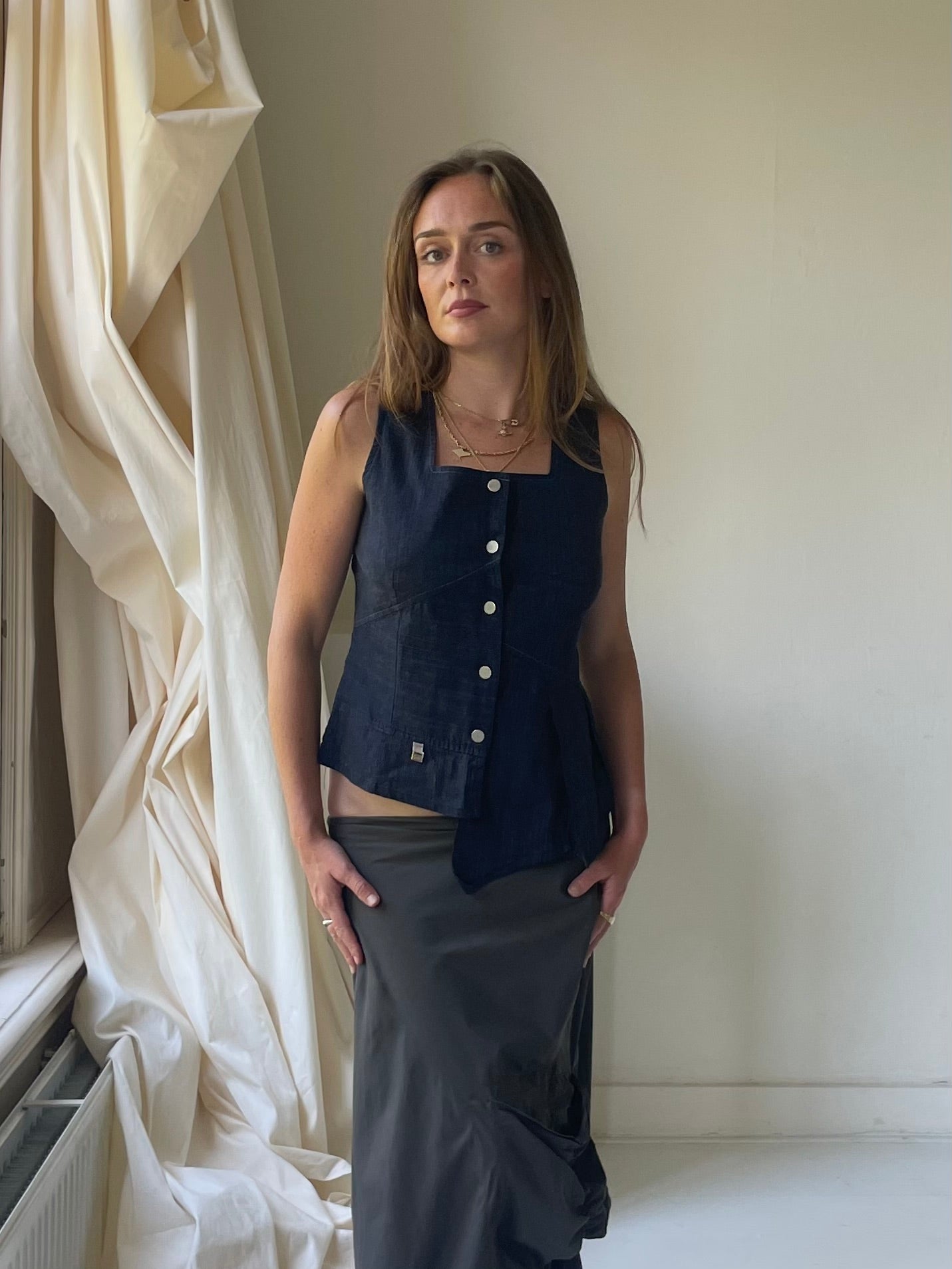 Asymmetrical gilet vest