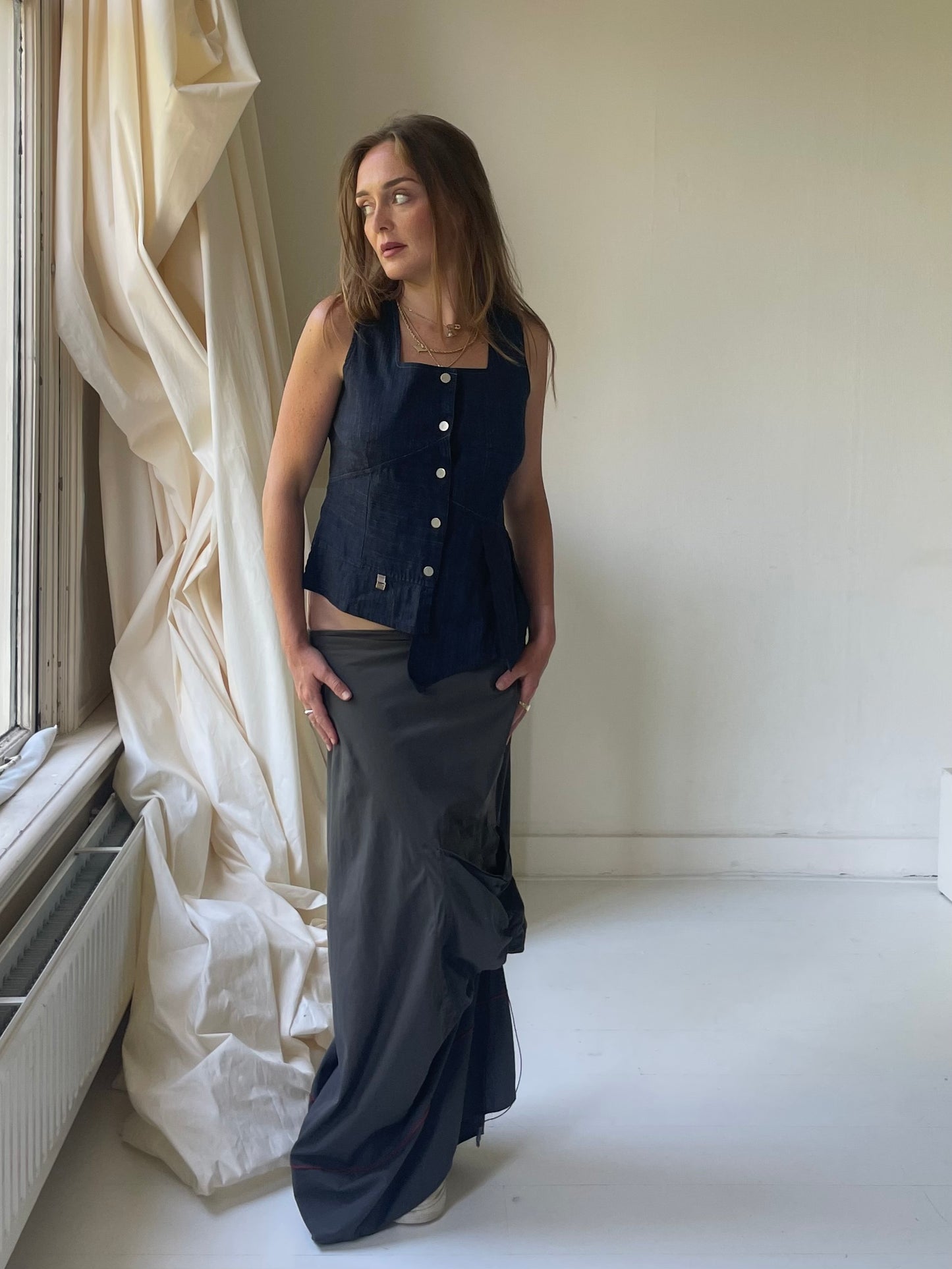 Asymmetrical gilet vest