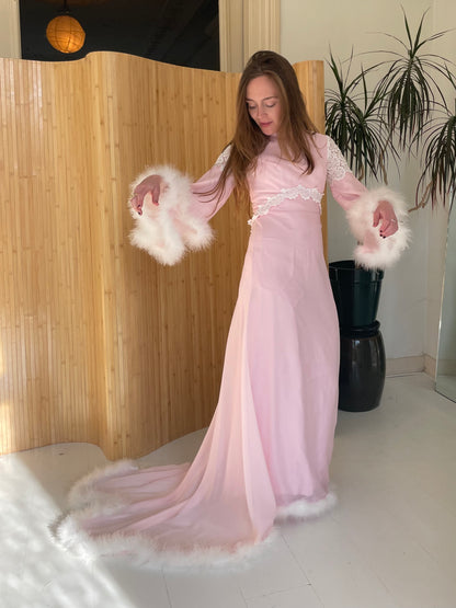 Pink feather trimmed gown with train
