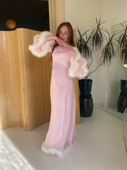 Pink feather trimmed gown with train