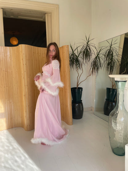 Pink feather trimmed gown with train