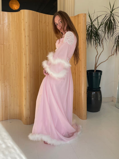 Pink feather trimmed gown with train