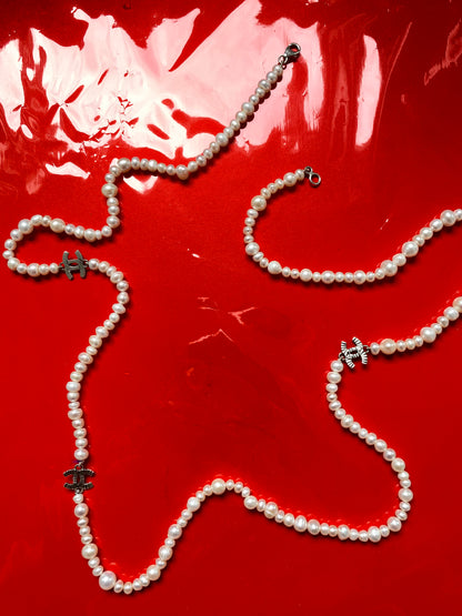Vintage pearl necklace with chanel charm