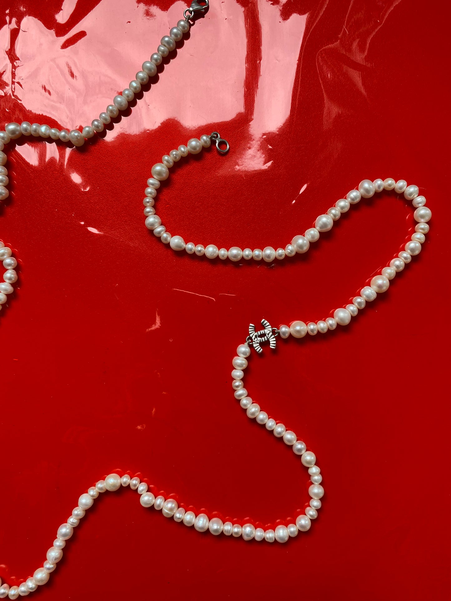 Vintage pearl necklace with chanel charm