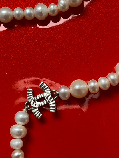 Vintage pearl necklace with chanel charm