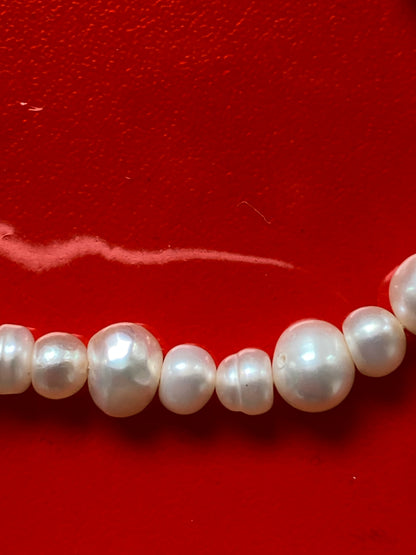 Vintage pearl necklace with chanel charm
