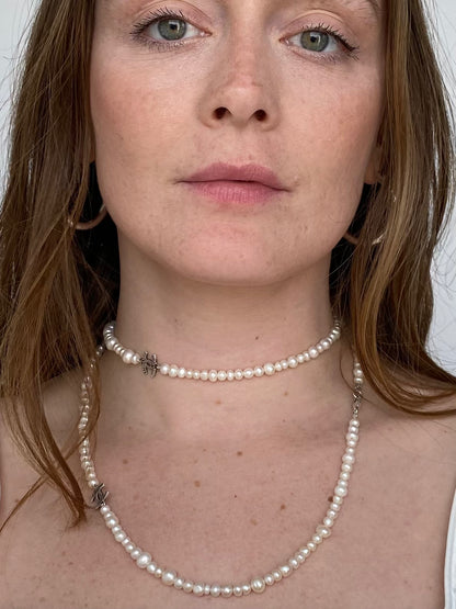 Vintage pearl necklace with chanel charm