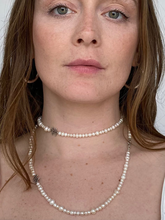 Vintage pearl necklace with chanel charm