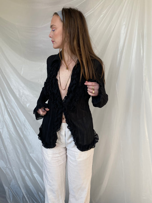 Sheer transparent ruffled blouse